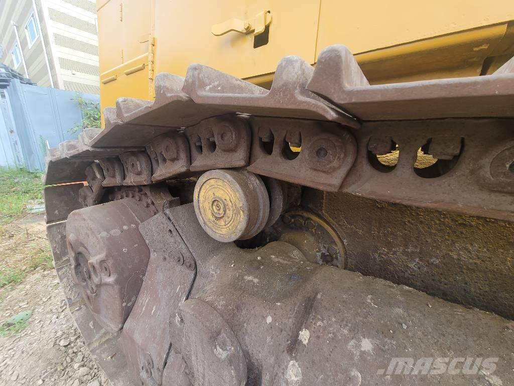 CAT 973 Гусеничні вантажники