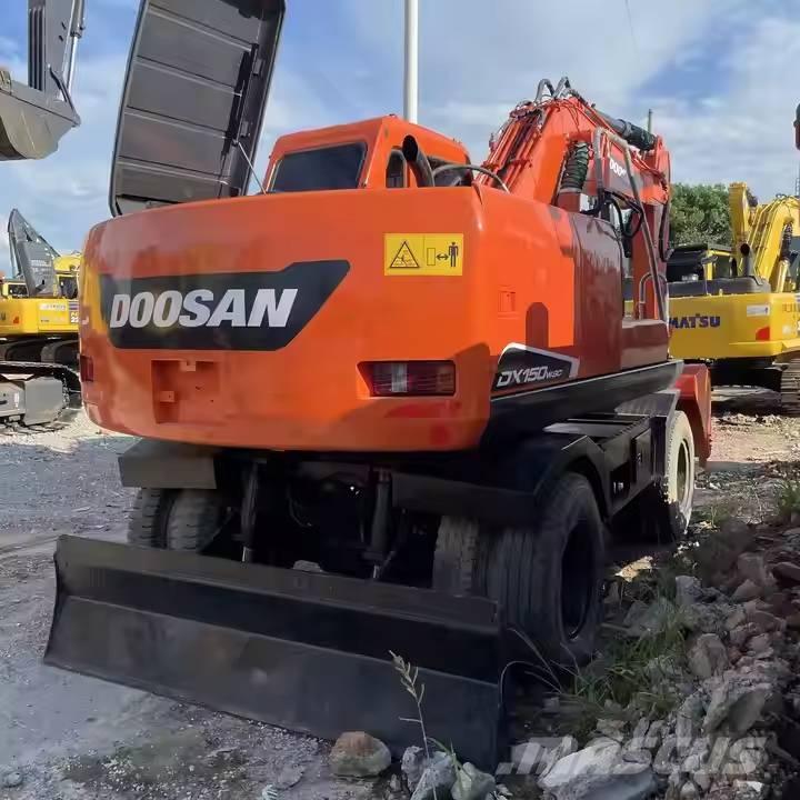 Doosan DX150W-9C Колісні екскаватори