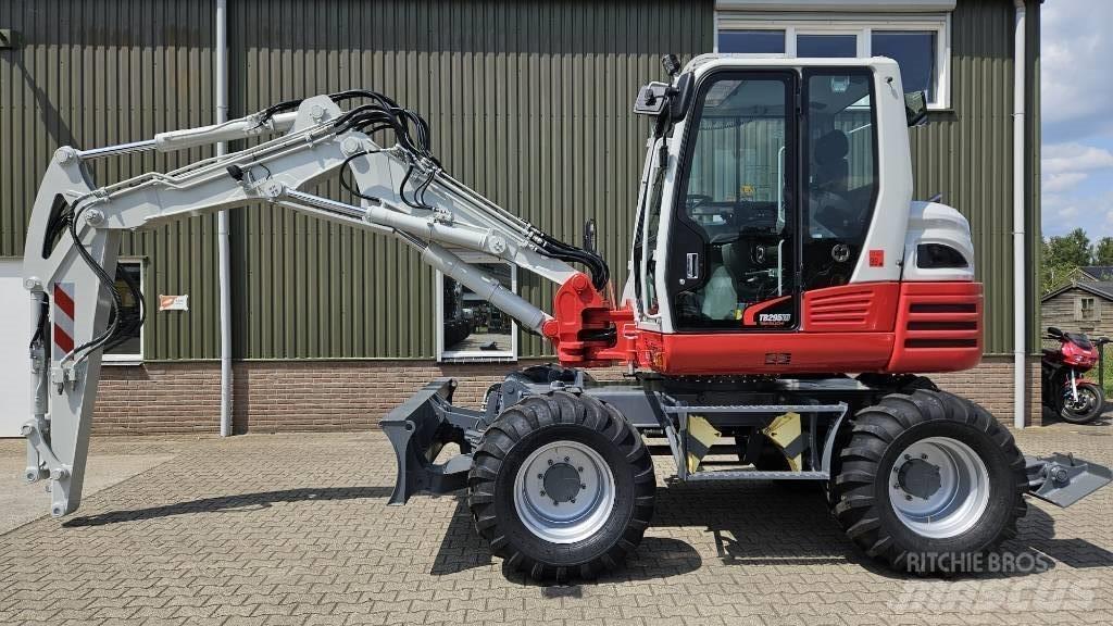 Takeuchi TB295W Колісні екскаватори