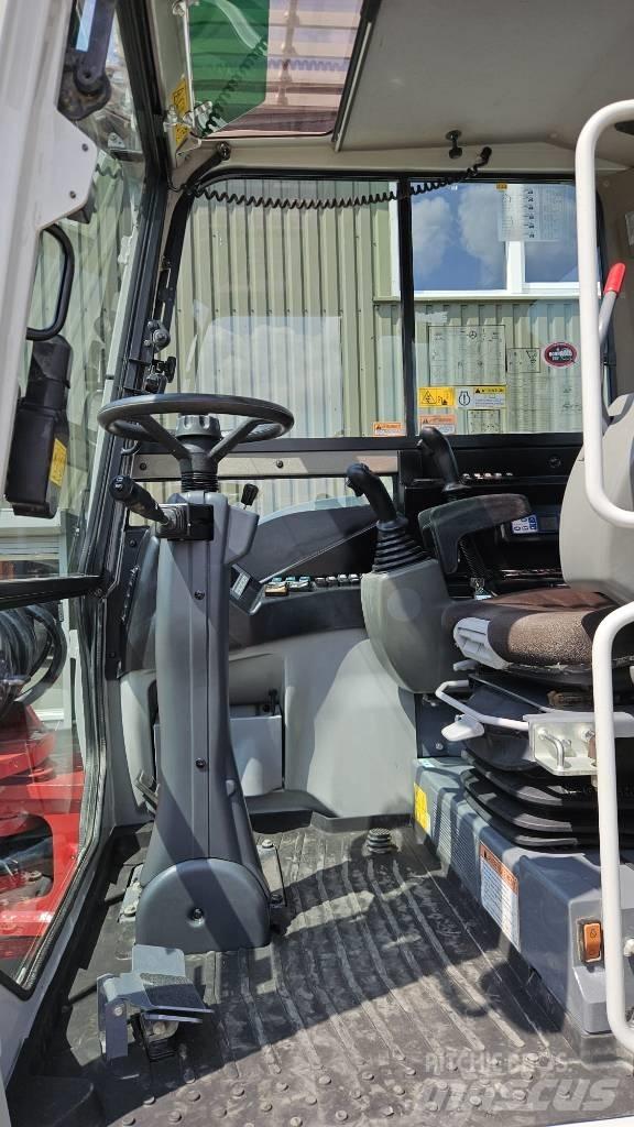 Takeuchi TB295W Колісні екскаватори