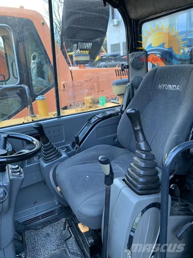 Hyundai R60W HW Колісні екскаватори