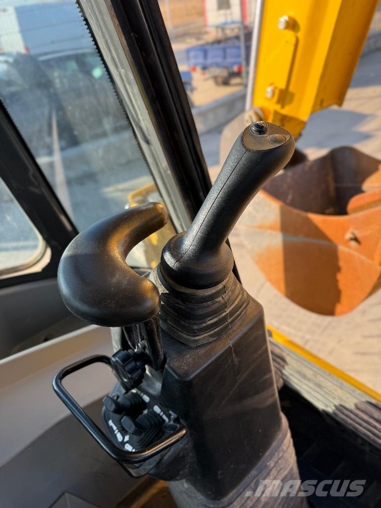 New Holland B 115 Екскаватори-навантажувачі