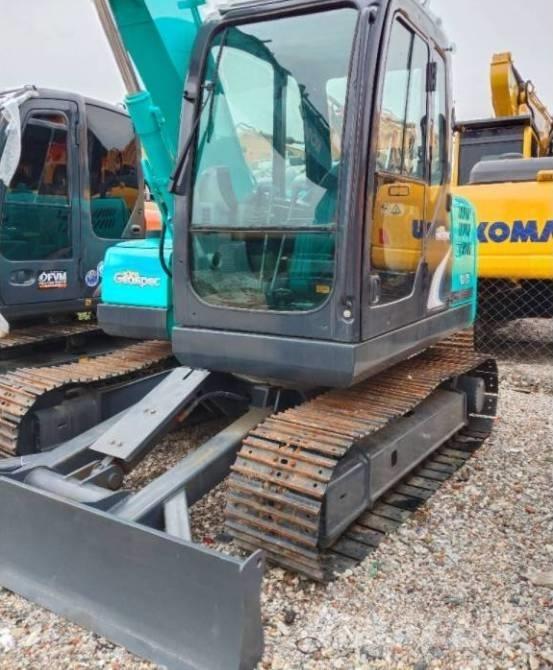 Kobelco SK 75 Середні екскаватори 7т. - 12т.