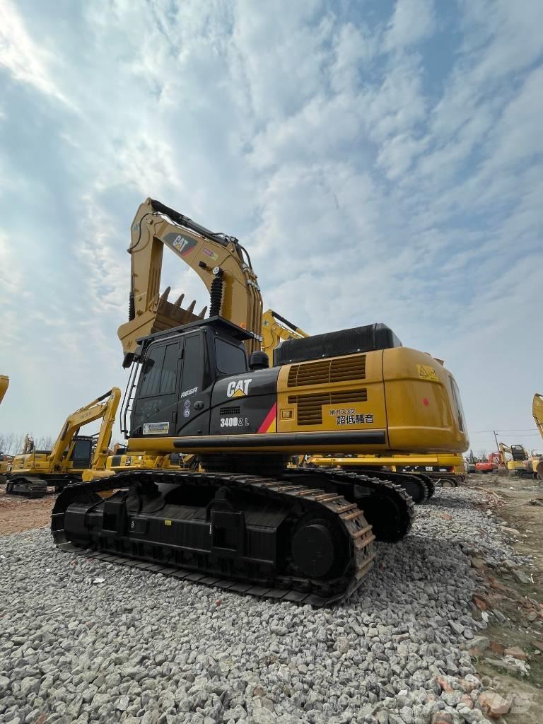 CAT 340 Гусеничні екскаватори
