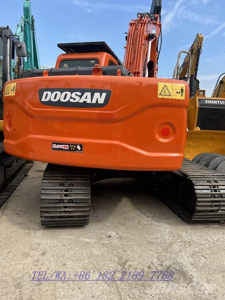 Doosan DX140 Гусеничні екскаватори
