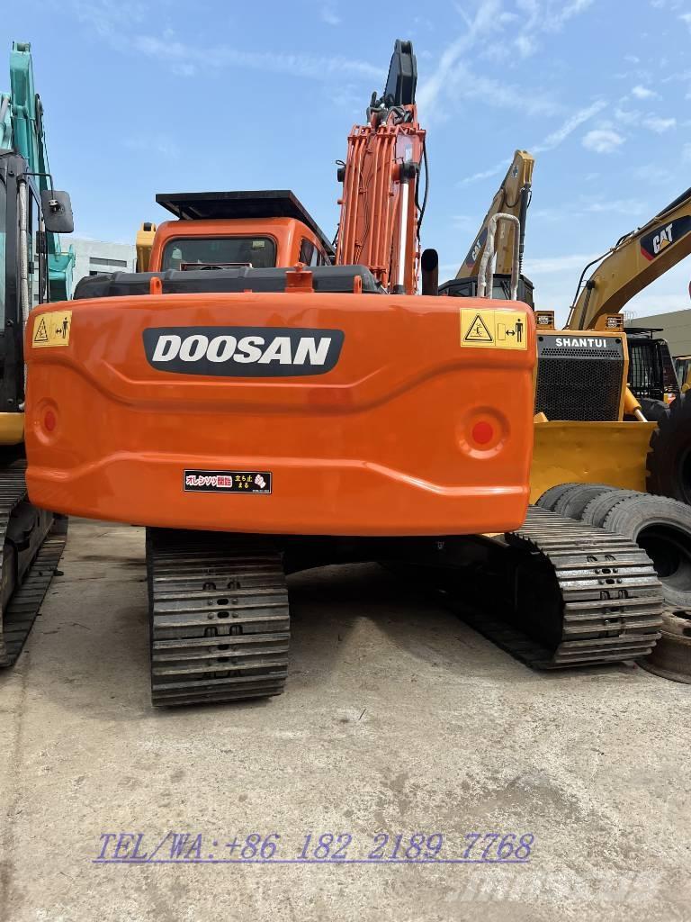 Doosan DX140 Гусеничні екскаватори