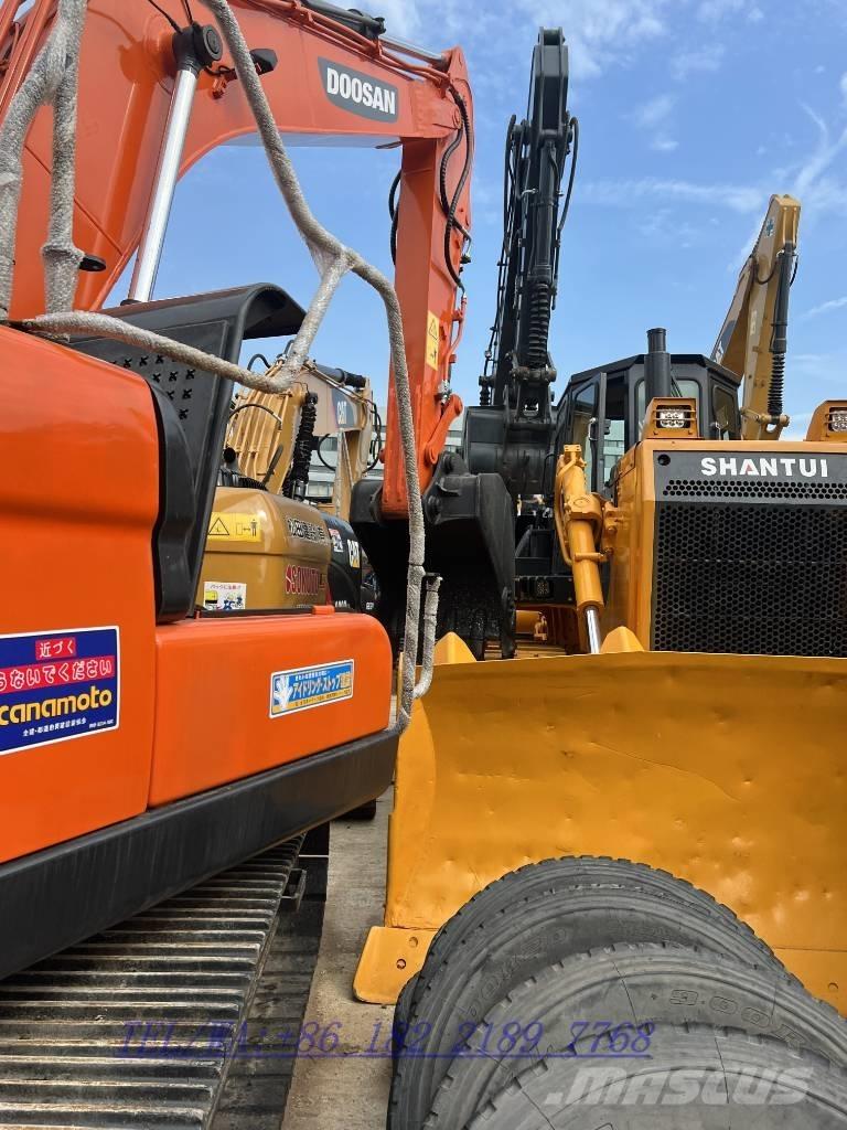 Doosan DX140 Гусеничні екскаватори