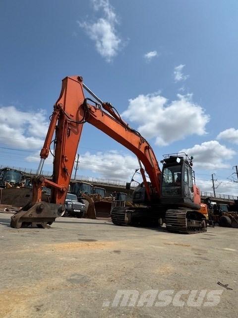 Hitachi ZX 225 Гусеничні екскаватори