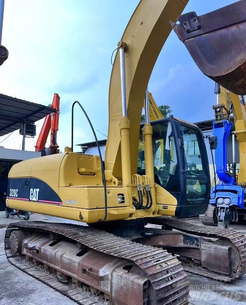CAT 320 C Гусеничні екскаватори