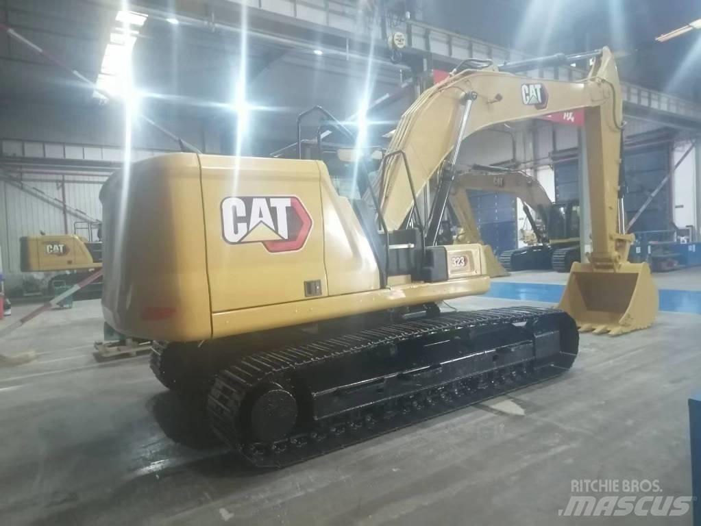 CAT 323 Гусеничні екскаватори