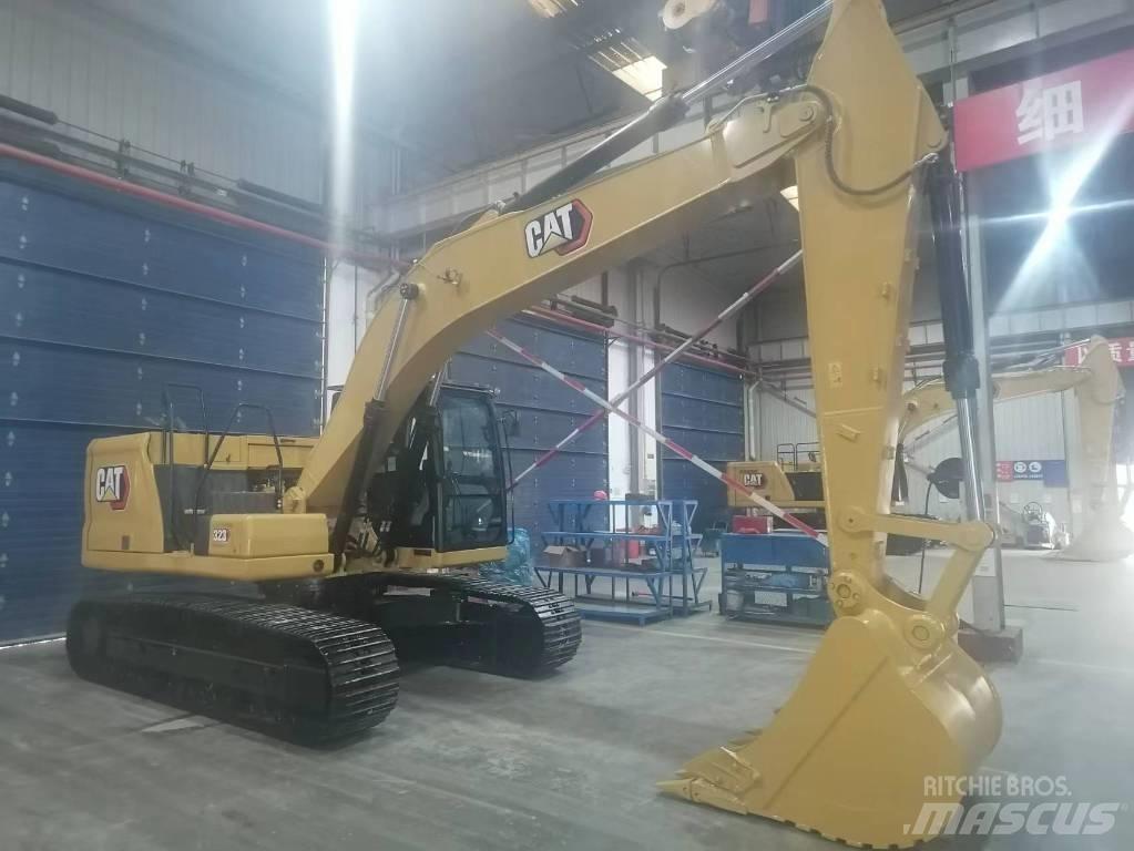 CAT 323 Гусеничні екскаватори