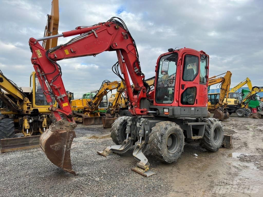 Komatsu PW98MR-8 Колісні екскаватори