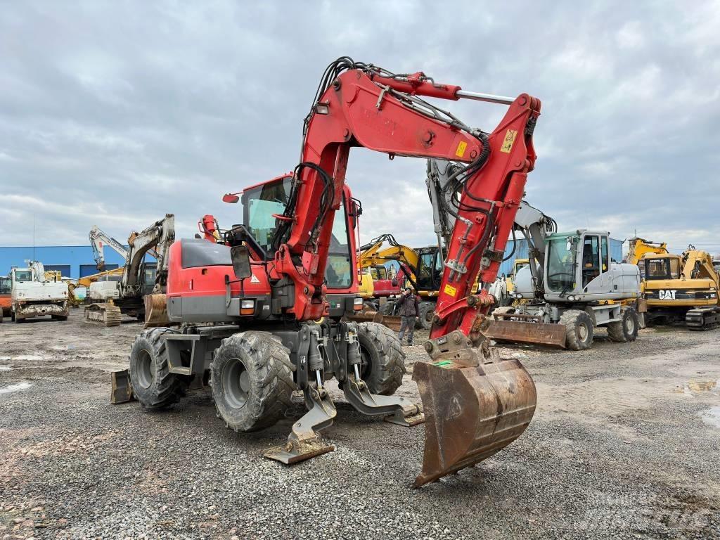 Komatsu PW98MR-8 Колісні екскаватори