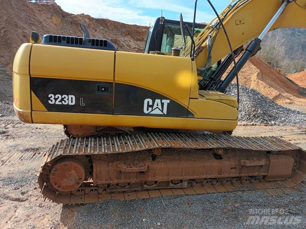 CAT 323 DL Гусеничні екскаватори