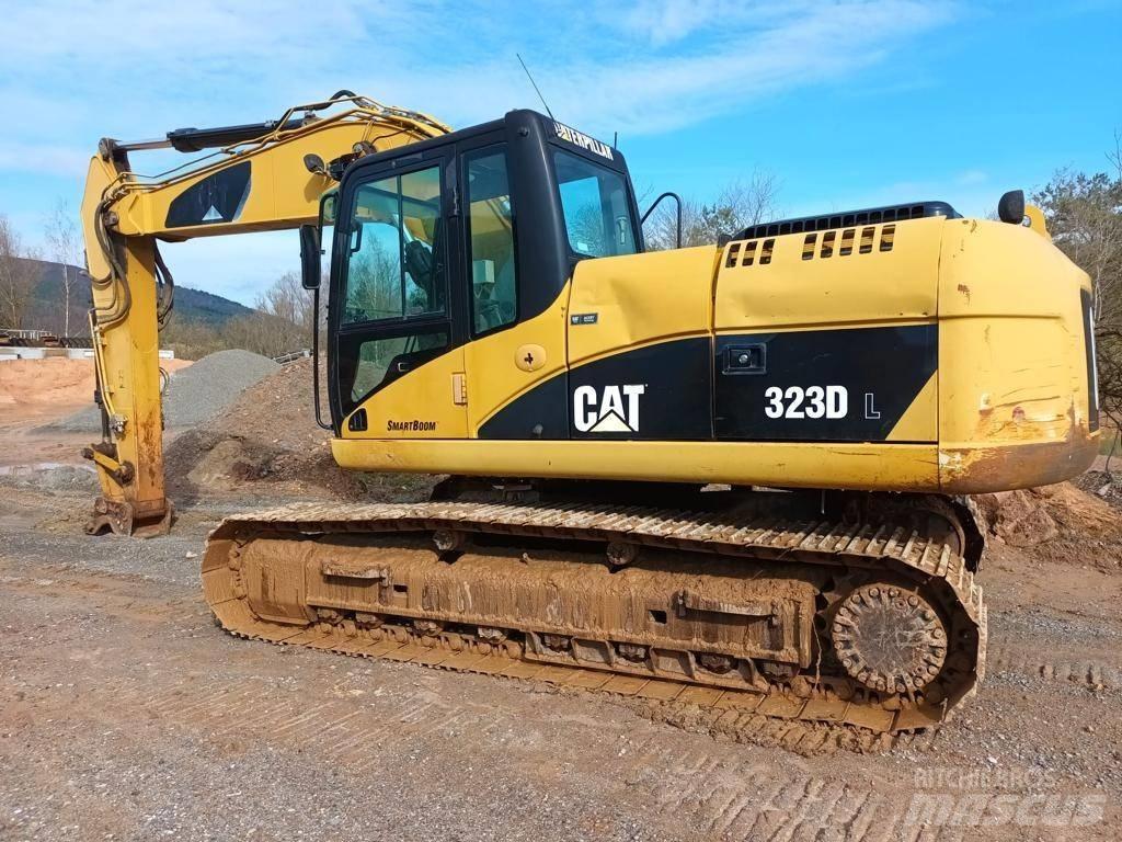 CAT 323 DL Гусеничні екскаватори