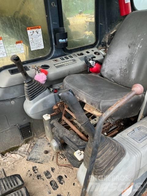 Komatsu PC 200 Гусеничні екскаватори