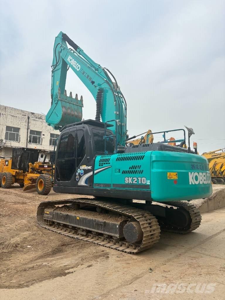 Kobelco SK 210 Гусеничні екскаватори