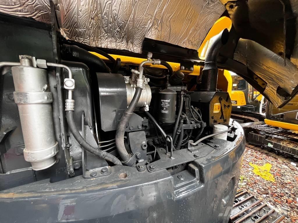 Komatsu PC 78 US Середні екскаватори 7т. - 12т.