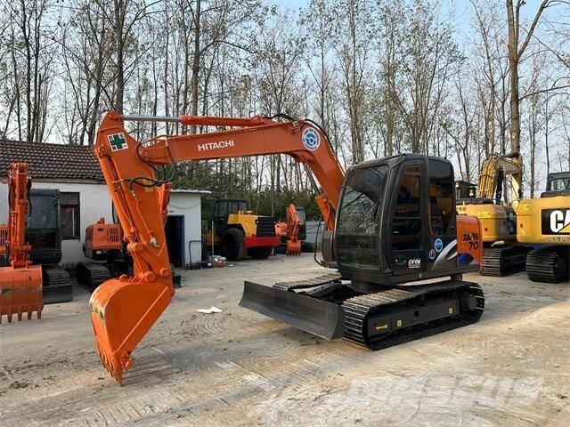 Hitachi ZX70 Гусеничні екскаватори