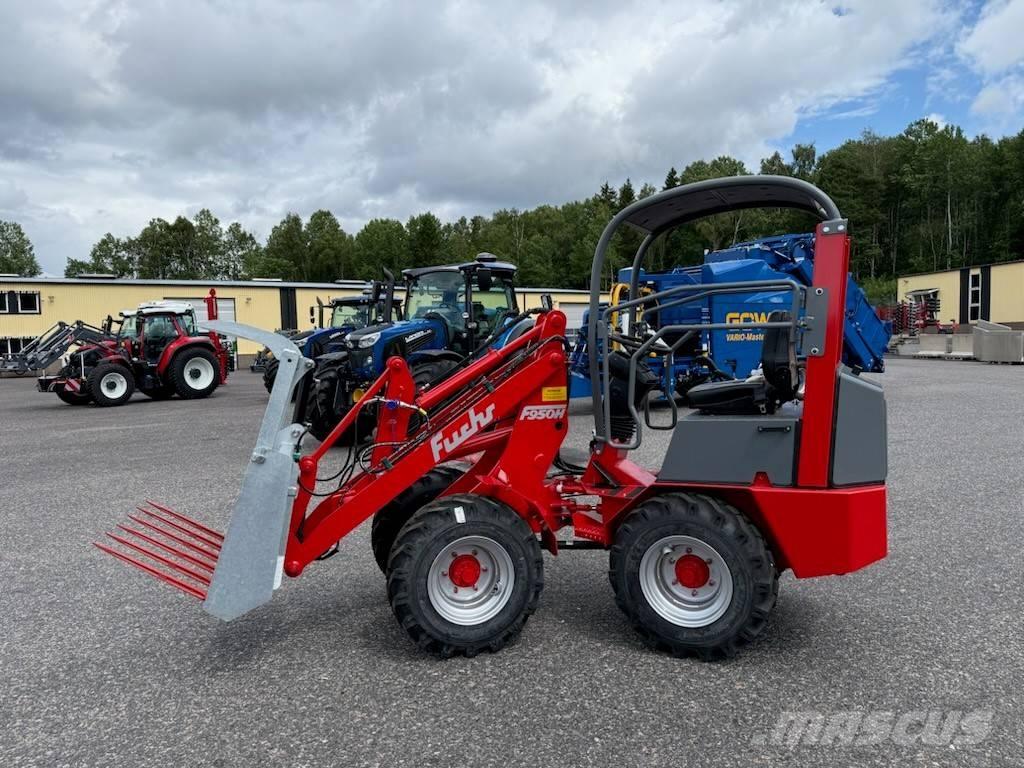 Fuchs F 950 H Багатофункціональне обладнання для вантажних і землекопальних робіт