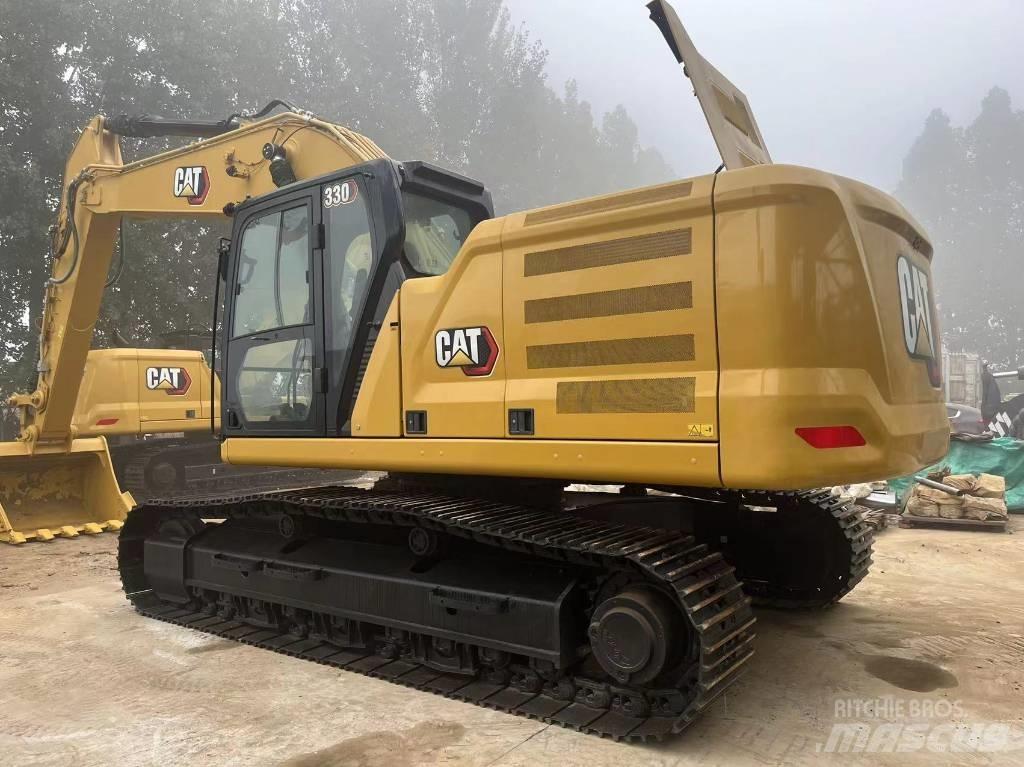 CAT 2021 CAT 330 Колісні екскаватори