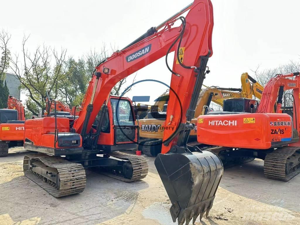 Doosan DX 140 Гусеничні екскаватори