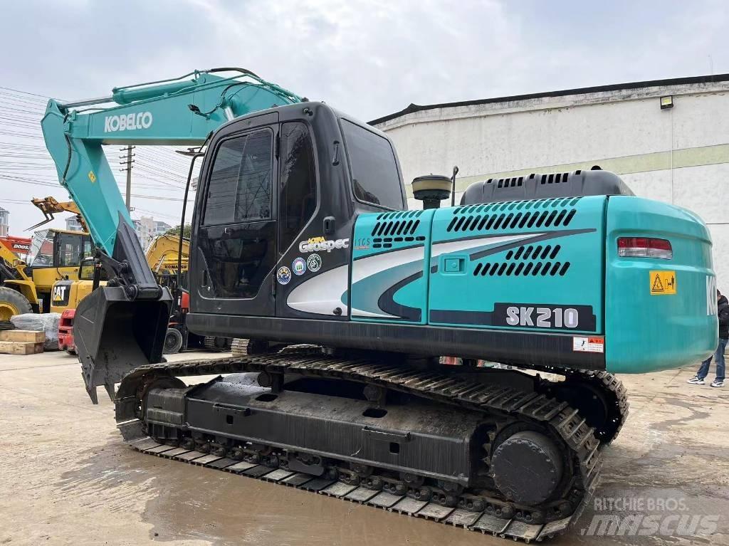 Kobelco SK 210 Гусеничні екскаватори