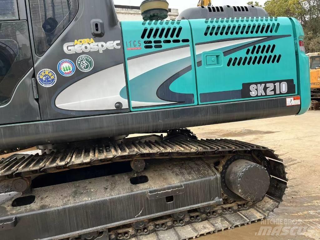 Kobelco SK 210 Гусеничні екскаватори
