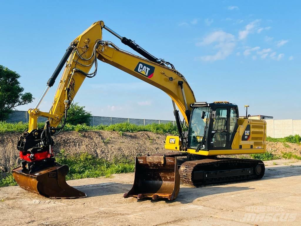 CAT 323 Гусеничні екскаватори