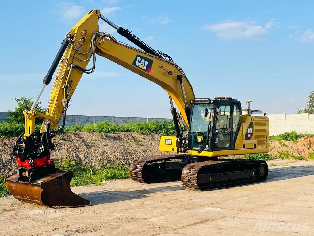 CAT 323 Гусеничні екскаватори