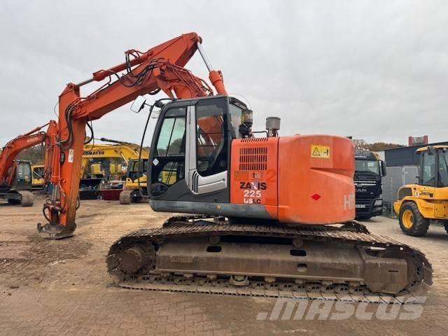 Hitachi ZX 225 US LC Гусеничні екскаватори