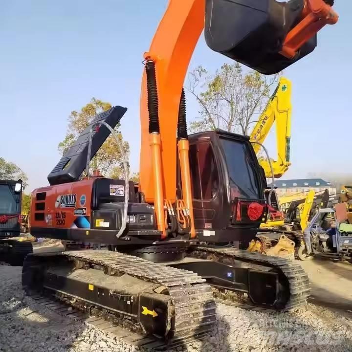 Hitachi ZX200 Гусеничні екскаватори