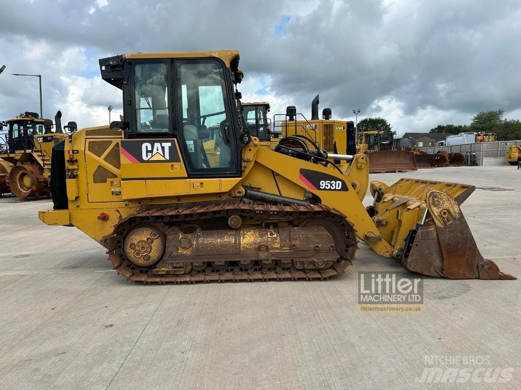 CAT 953D Гусеничні вантажники