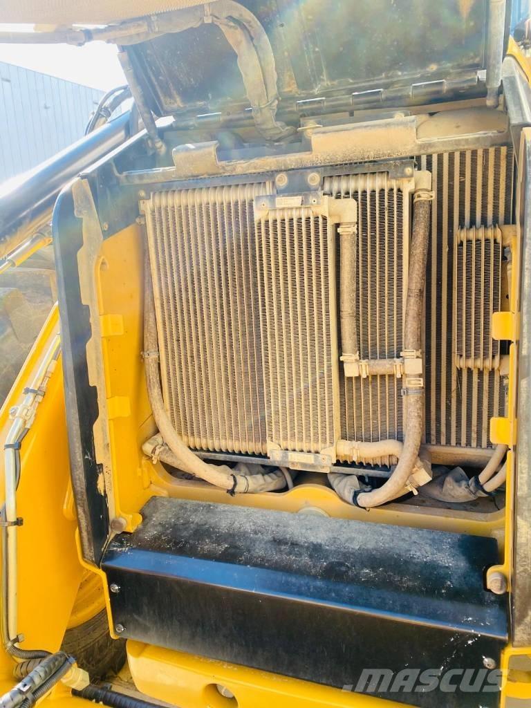 CAT 444  4x4 Екскаватори-навантажувачі