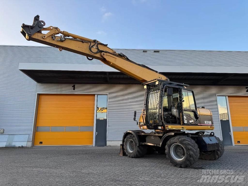 CAT M315C Колісні екскаватори