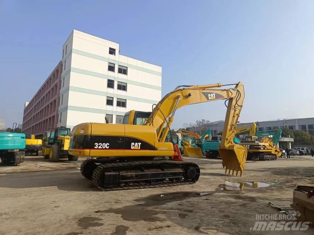 CAT 320 C Гусеничні екскаватори