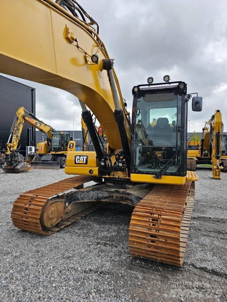 CAT 320 Гусеничні екскаватори