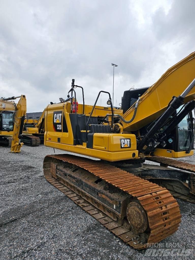 CAT 320 Гусеничні екскаватори