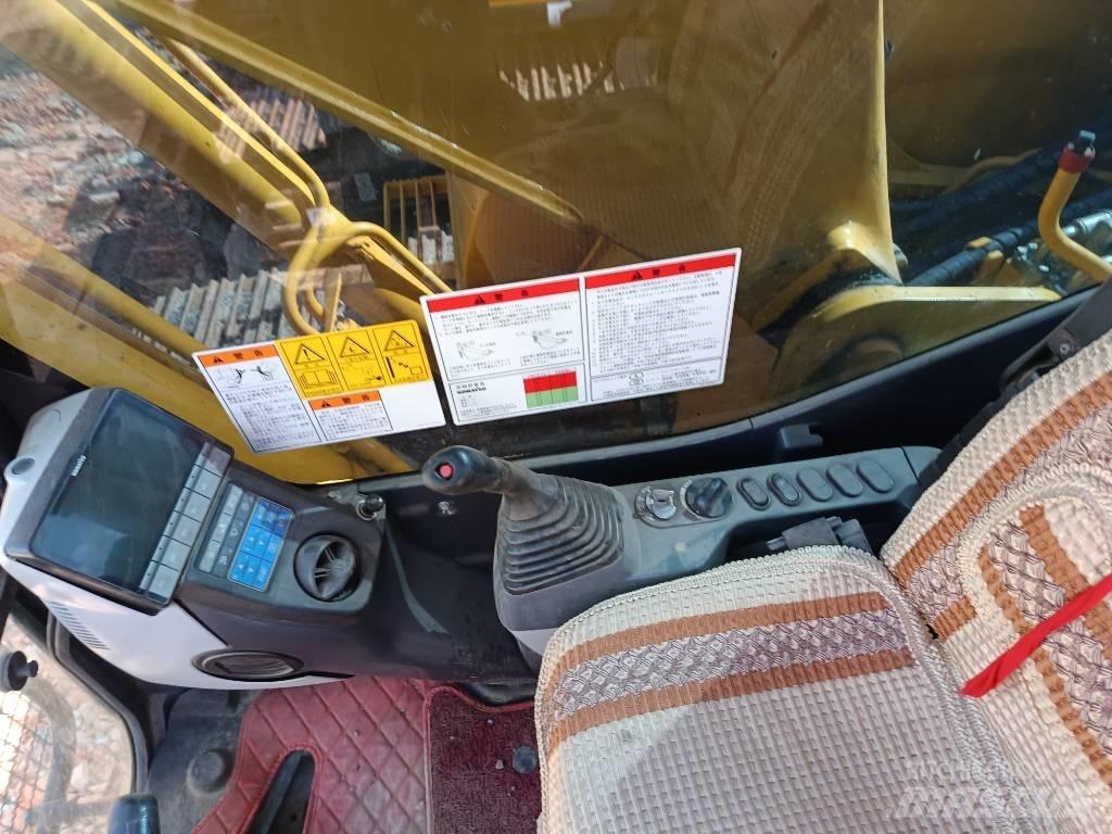 Komatsu PC200 Середні екскаватори 7т. - 12т.