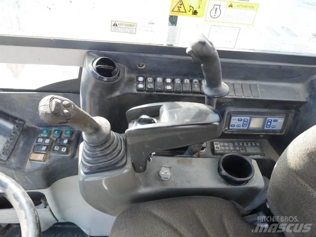 Takeuchi TB 295 W Колісні екскаватори