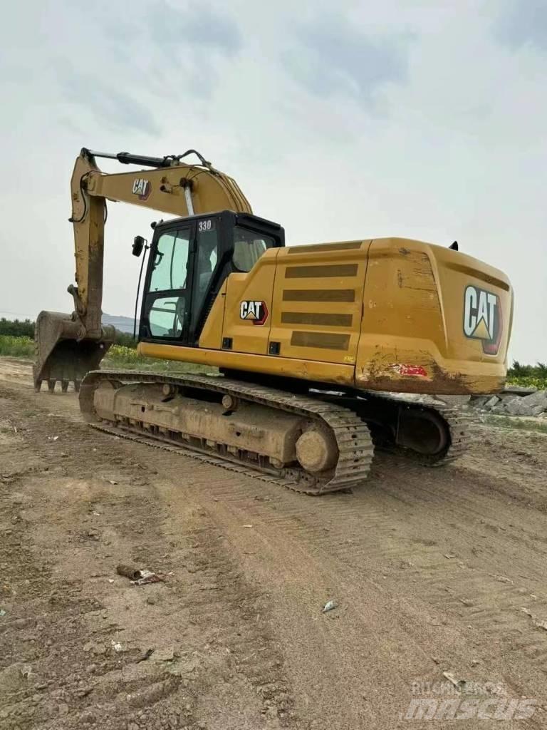 CAT 330 Гусеничні екскаватори