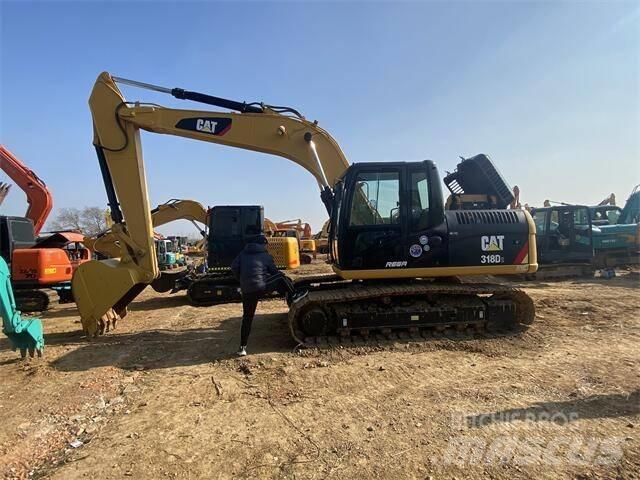 CAT 318D2 Гусеничні екскаватори