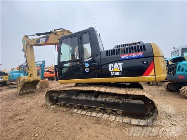 CAT 318D2 Гусеничні екскаватори