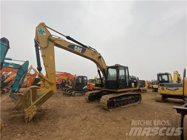 CAT 318D2 Гусеничні екскаватори