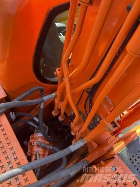 Doosan DX225LC-9C Гусеничні екскаватори