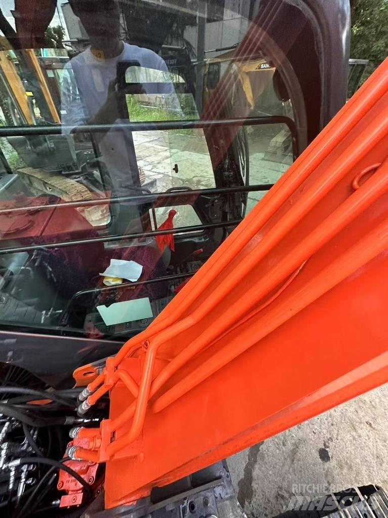 Hitachi ZX 70 Гусеничні екскаватори