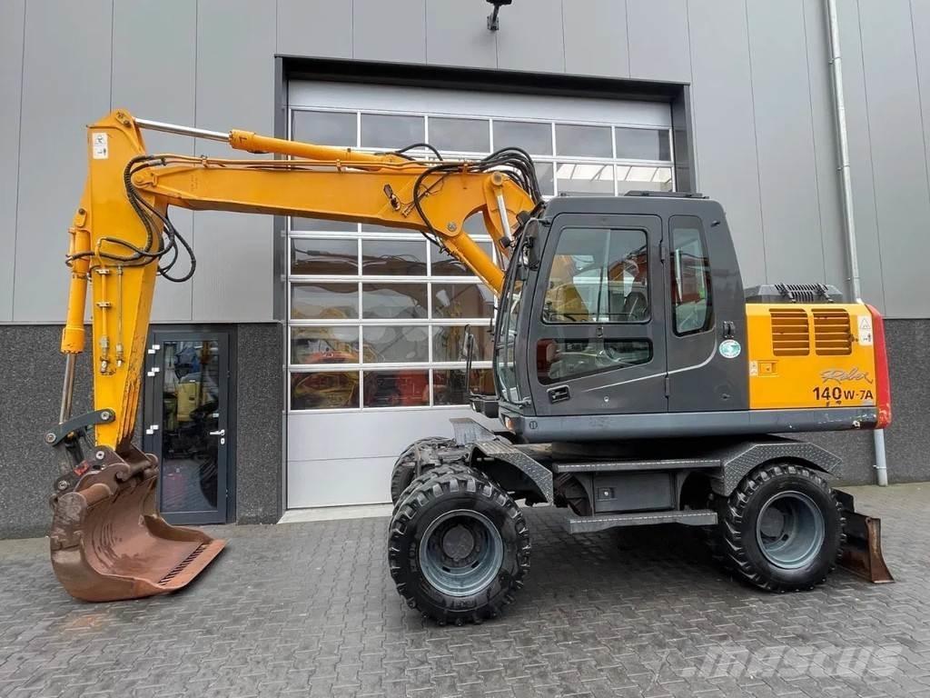 Hyundai R140W-7A Колісні екскаватори