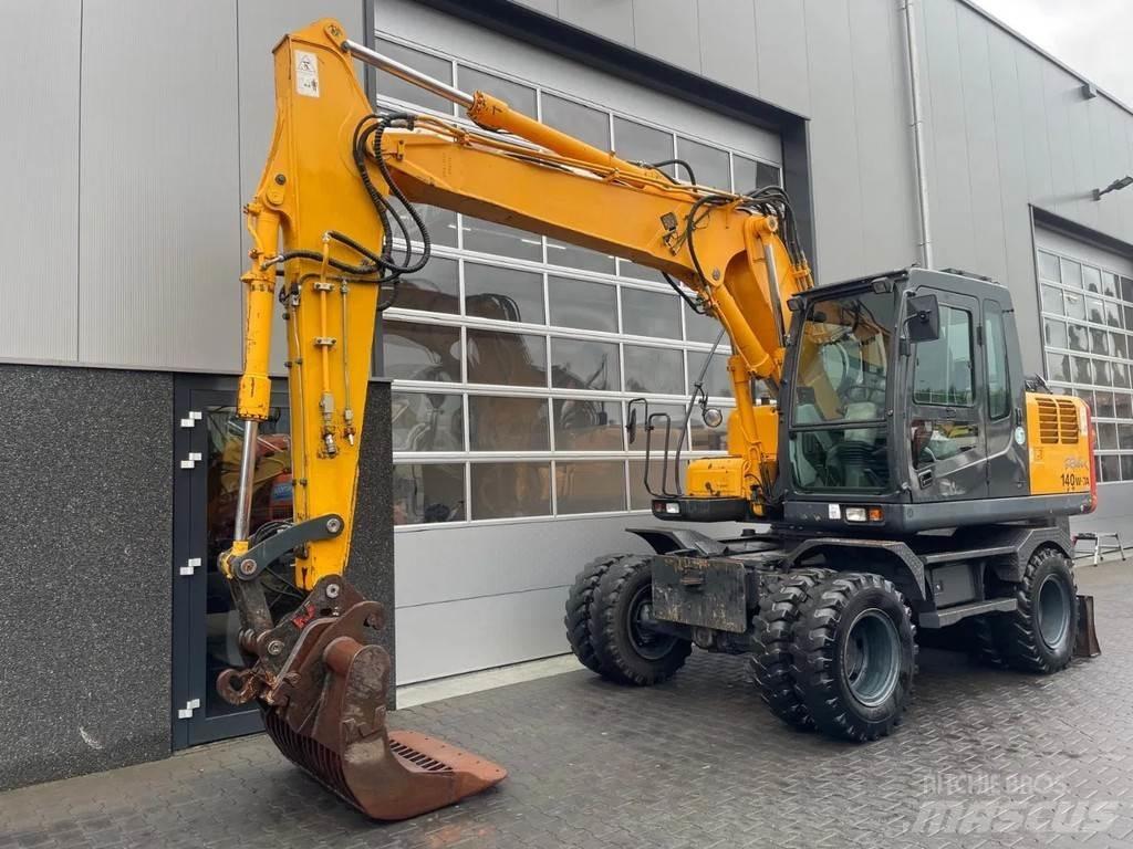Hyundai R140W-7A Колісні екскаватори