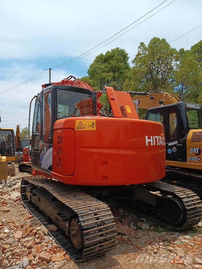Hitachi ZX 135 Гусеничні екскаватори
