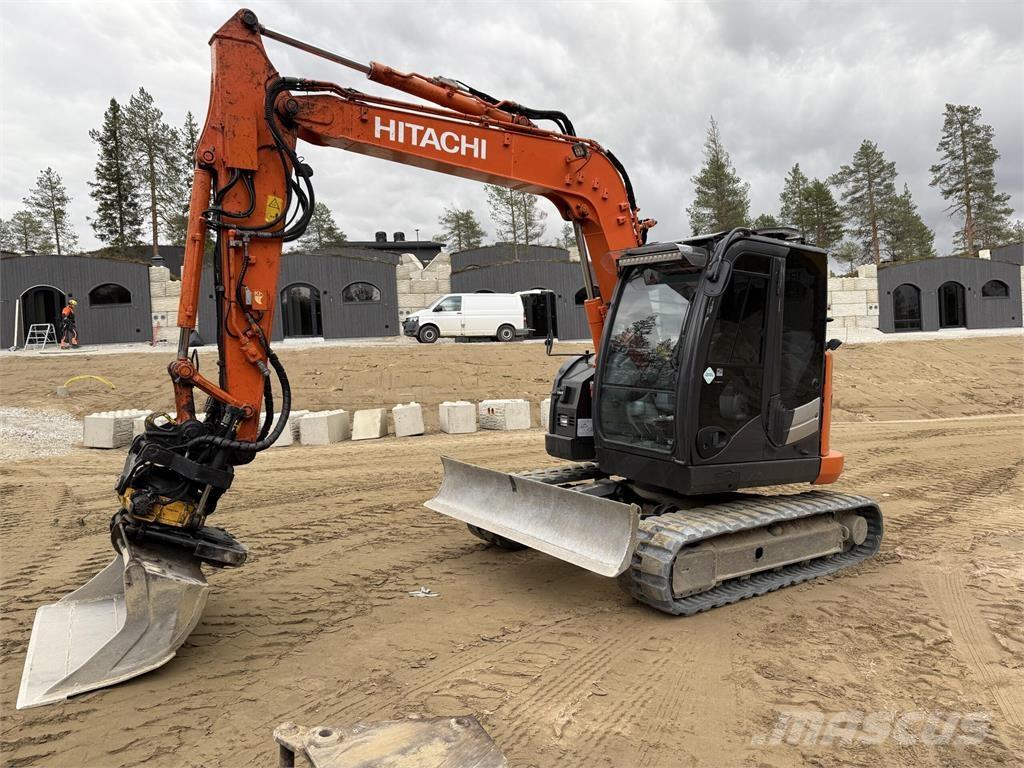 Hitachi ZX85US Середні екскаватори 7т. - 12т.